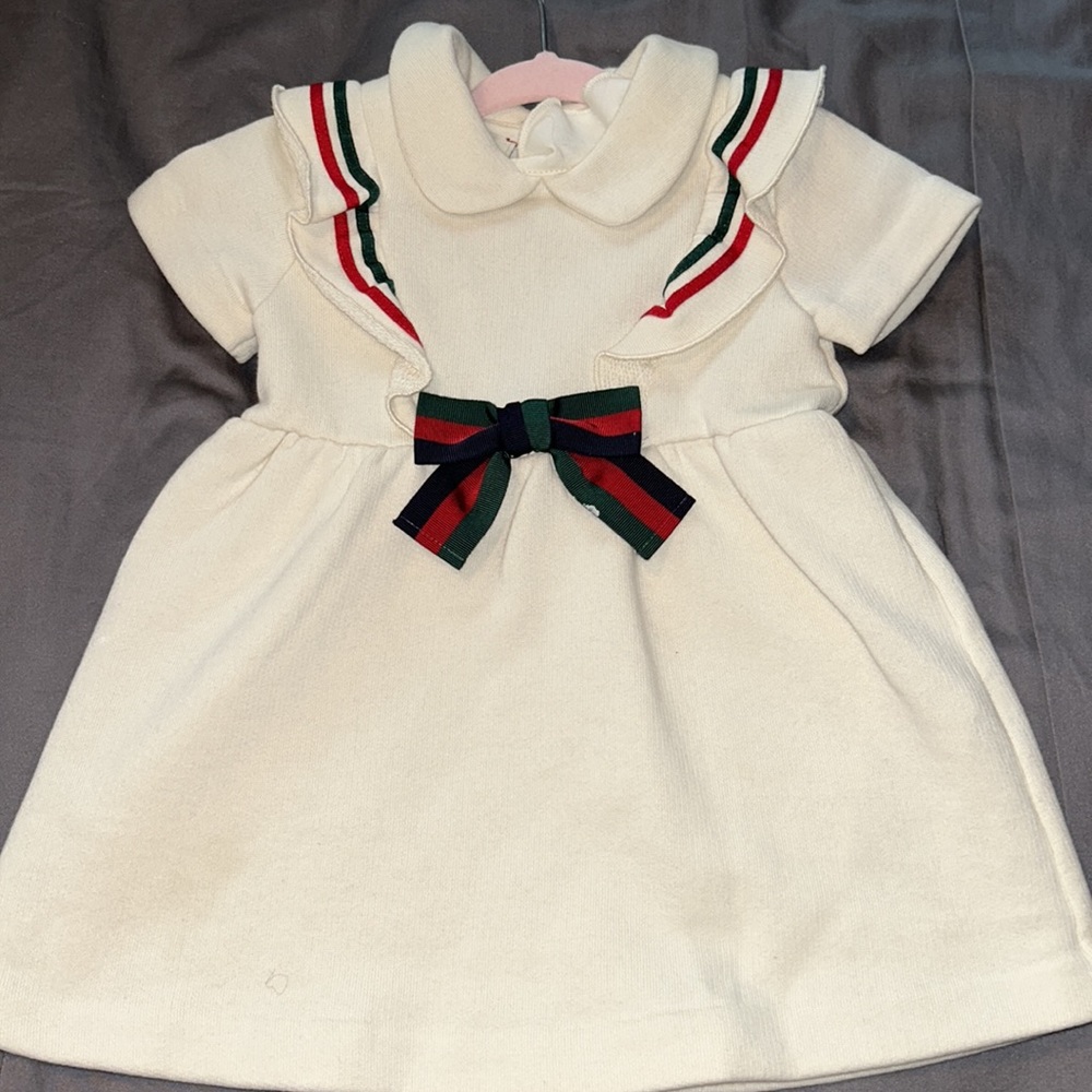 2 Gucci dresses.